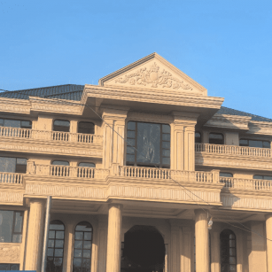 钦州黄金麻别墅外墙干挂石材效果示例