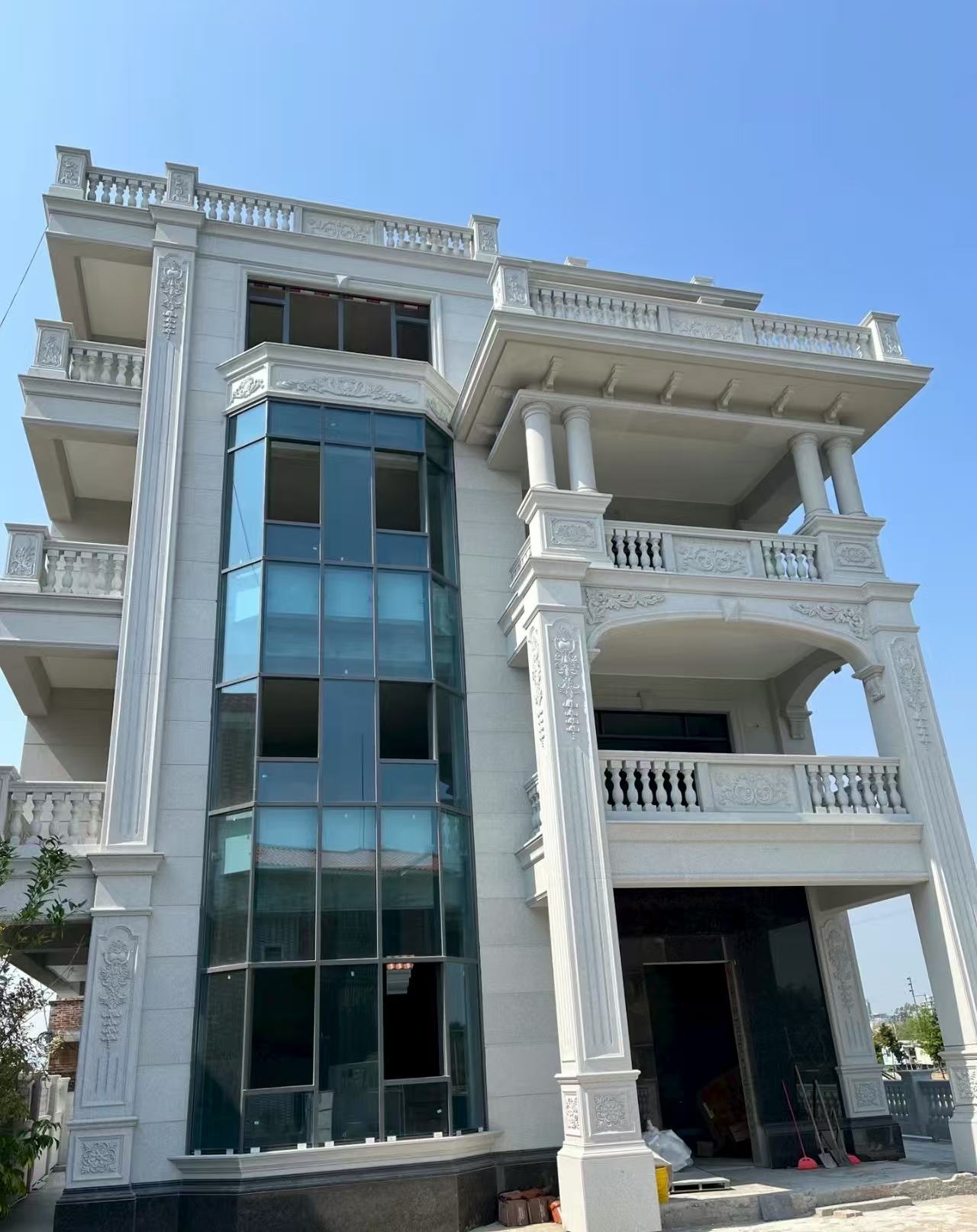 钦州 白麻花岗岩别墅外墙干挂效果展示