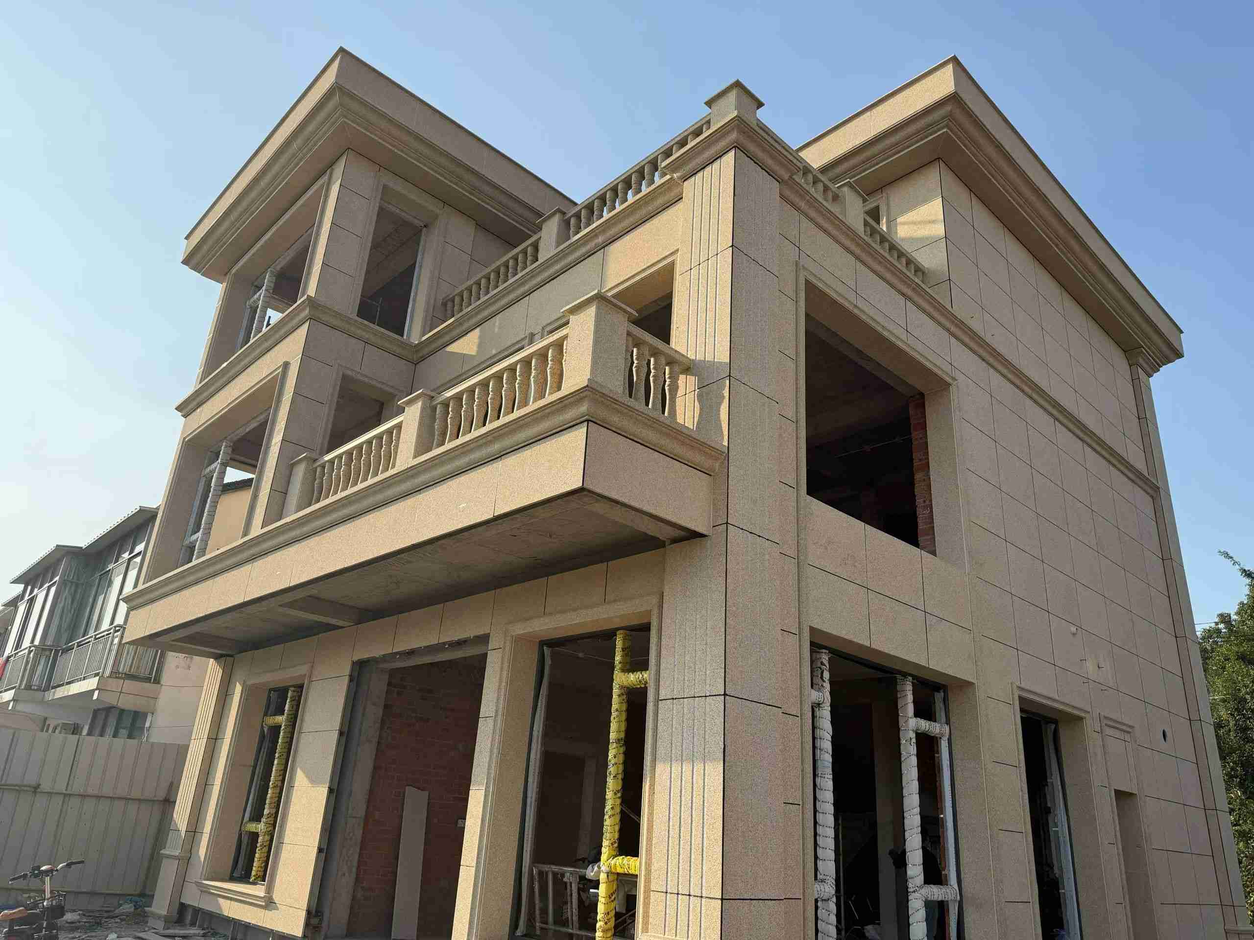 钦州 黄金麻花岗岩石材荔枝面外墙干挂效果展示